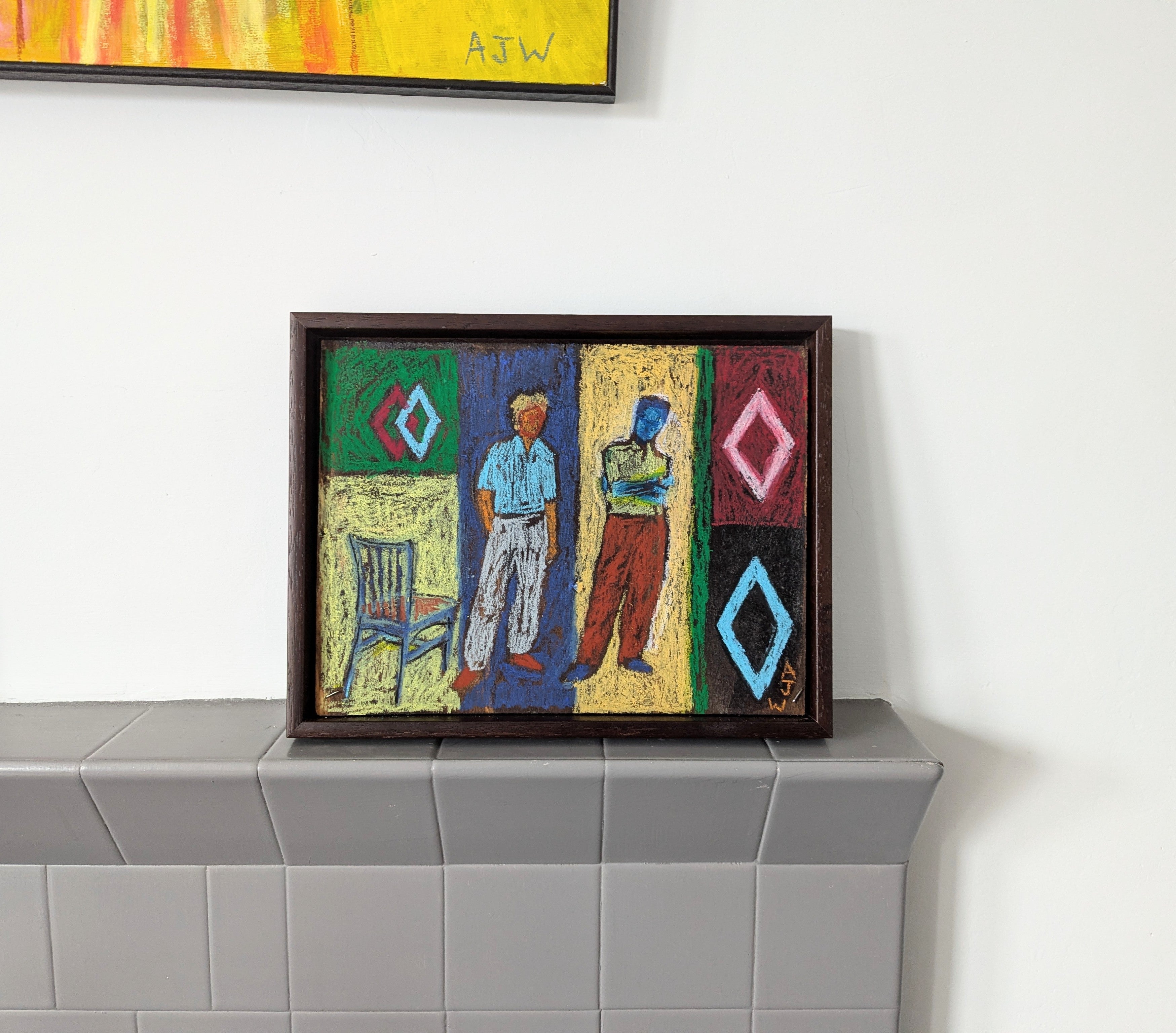 Two Figures with Diamonds and a Chair